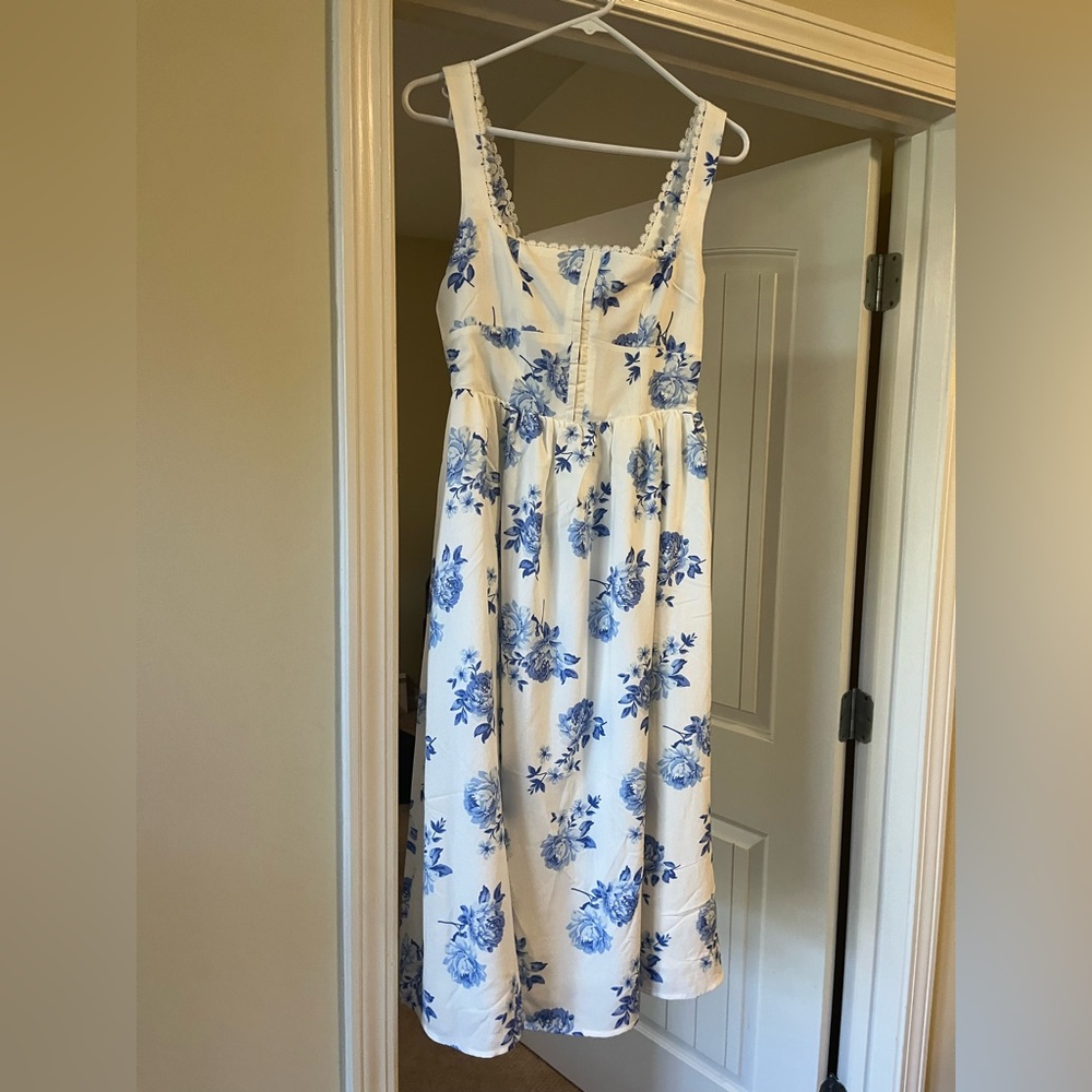 Francesca’s small white and blue floral dress